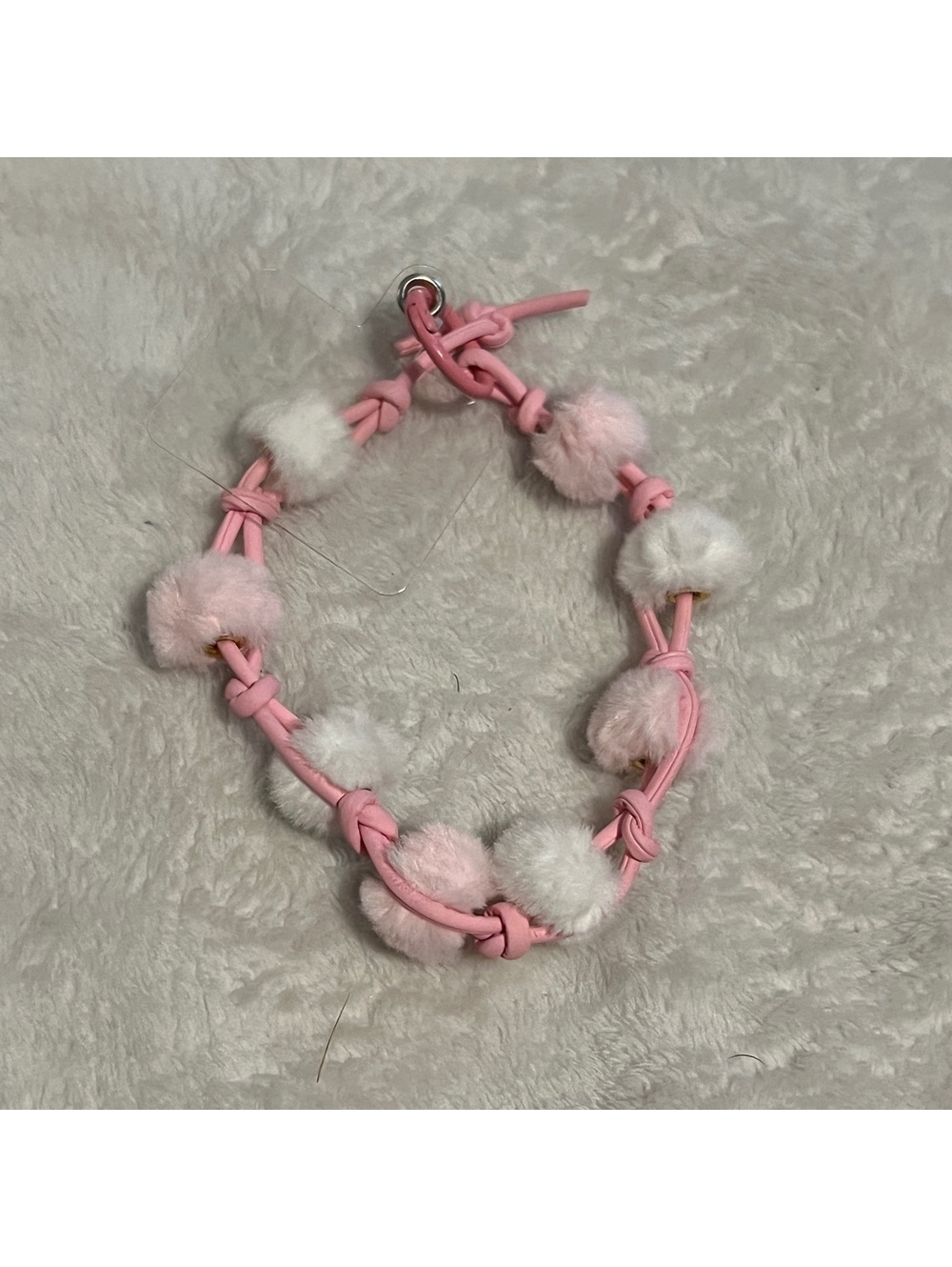 Pink pom pom bracelet